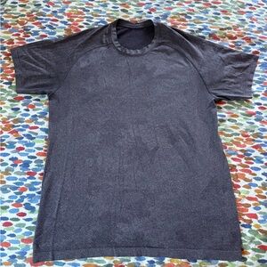 Great condition men’s large lululemon purple/grayish athletic shirt